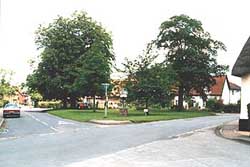Great Hockham village green with the ceremonial turning stone