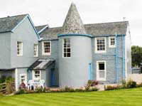 comfortable 4 star apartments in turreted building near Loch Lomond Scotland.  Each apartment sleeps 2-4 people.