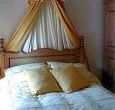 Romantically styled bedroom with en-suite