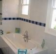Family bathroom with shower.