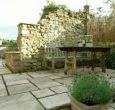 Long back garden with an area to sit