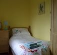 Single bedroom with garden views