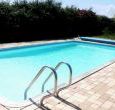 Solar heated swimming pool