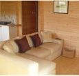 Cosy and smart timber fishing lodge with views over the lake