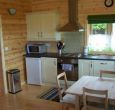 The kitchen is well-equipped and part of the open plan living area