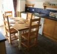 The kitchen with doors to the garden
