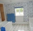 Bathroom with twin basin and bath