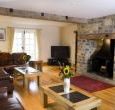 Living room with inglenook fireplace