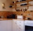 The recently installed, well equipped kitchen, .