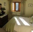 Comfortable bright bedroom with 5ft bed