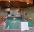 Heated pool with wave-jet machine