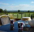 Afternoon tea or read a book in the garden of Puddings Barn Cottage