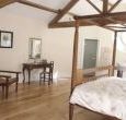 A four poster bed, lots of light and space in Yellowdrama cottage