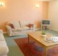 Living room with 28 in colour TV