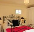 Individually themed bedrooms with soft furnishings from the Designers Guild 