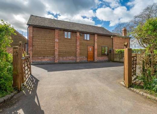 Light and spacious lounge with doors opening out in to the garden