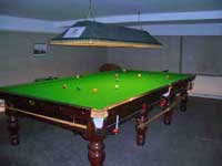 cottage with a snooker table
