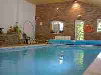heated indoor swimming pool at Barling's Barn in Powys, mid Wales