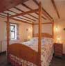 self-catering holiday cottage with a four poster bed
