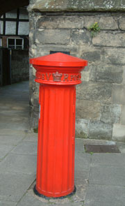 Post box in the shape of a Doric pillar