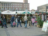 The market in Norwich with views of the City Hall beyond