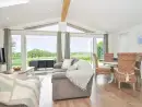 Open plan living area at 1 Horizon View - thumbnail photo