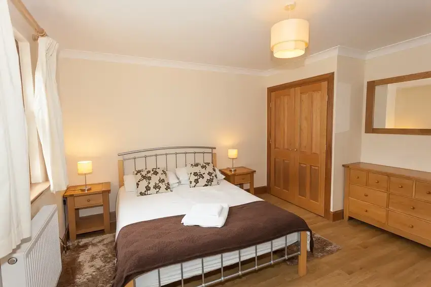 Bedroom at 3 Bedroom Rental at Williamscraig Holiday Cottages