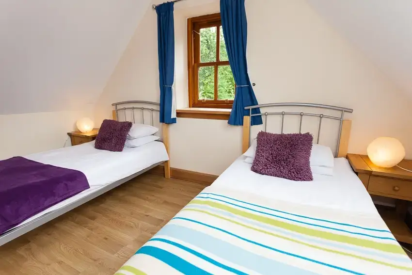 Bedroom at 3 Bedroom Rental at Williamscraig Holiday Cottages