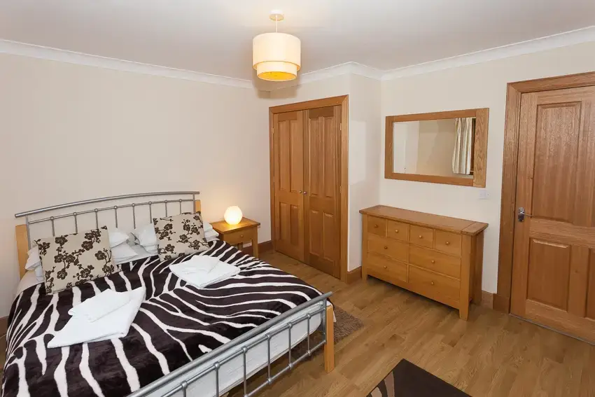 Bedroom at 3 Bedroom Rental at Williamscraig Holiday Cottages