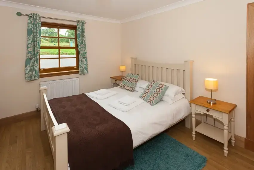 Bedroom at 3 Bedroom Rental at Williamscraig Holiday Cottages