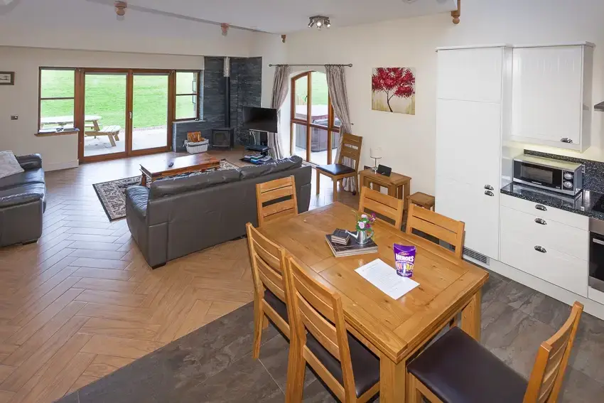 Open plan living area at 3 Bedroom Rental at Williamscraig Holiday Cottages