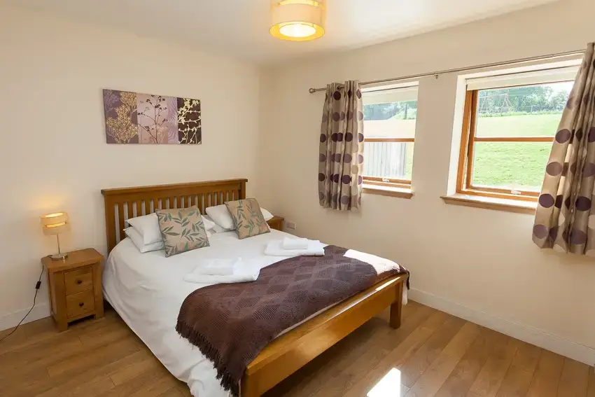 Bedroom at 3 Bedroom Rental at Williamscraig Holiday Cottages