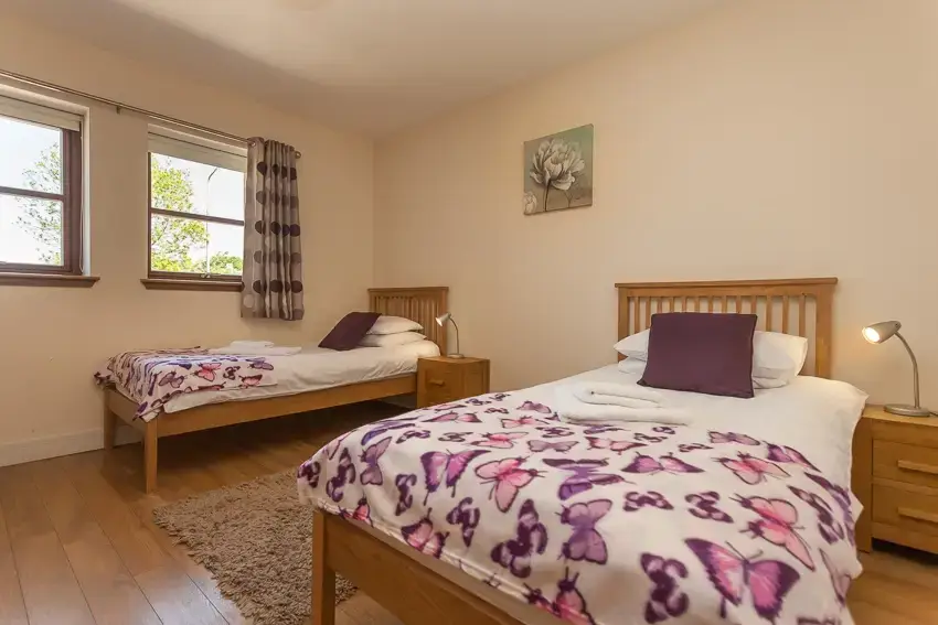 Bedroom at 3 Bedroom Rental at Williamscraig Holiday Cottages