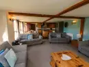 Open plan living area at Apple Barn - thumbnail photo