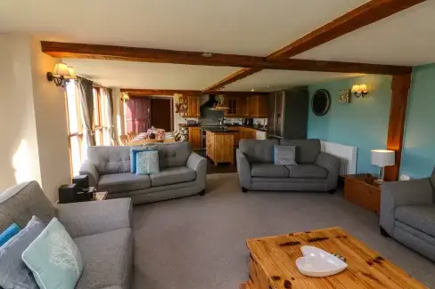 Open plan living area at Apple Barn, Devon