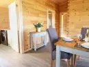Kitchen/diner at Bacheiddon Log Cabin - thumbnail photo