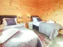 Bedroom at Bacheiddon Log Cabin - thumbnail photo