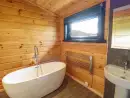 Ensuite bathroom at Bacheiddon Log Cabin - thumbnail photo