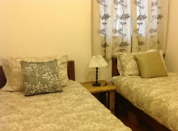 Bedroom at Balebarn Eco Lodge