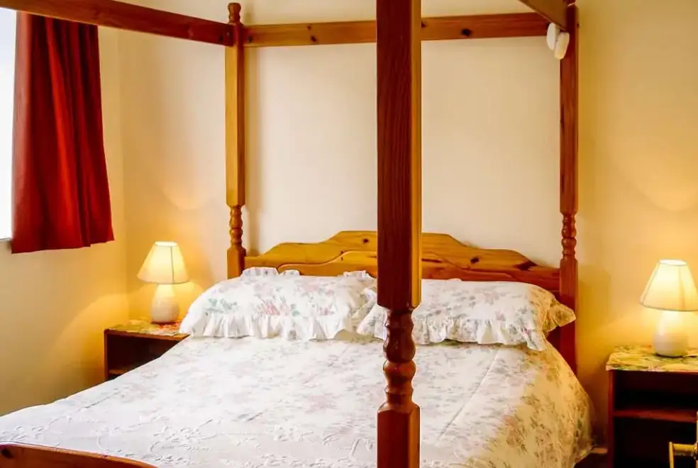 Bedroom at Beachcomber at Watermouth Cove Cottages