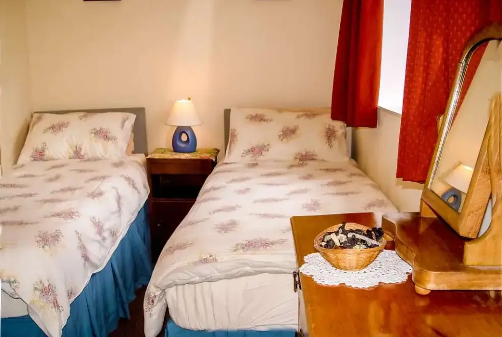 Bedroom at Beachcomber at Watermouth Cove Cottages