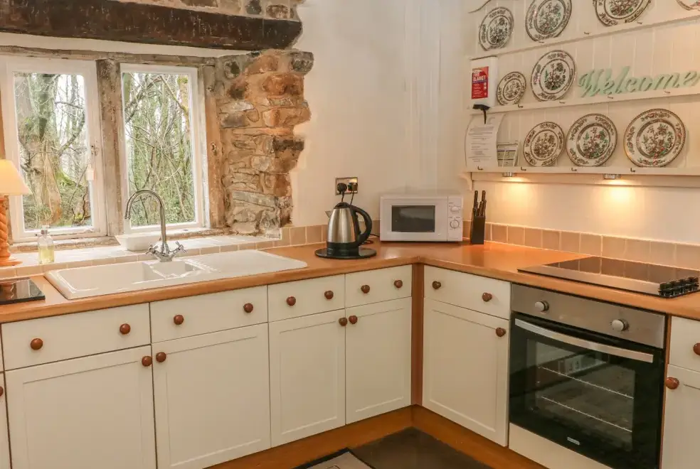 Farmhouse style kitchen at Beckside Dogs-welcome Cottage,  The Lake District 