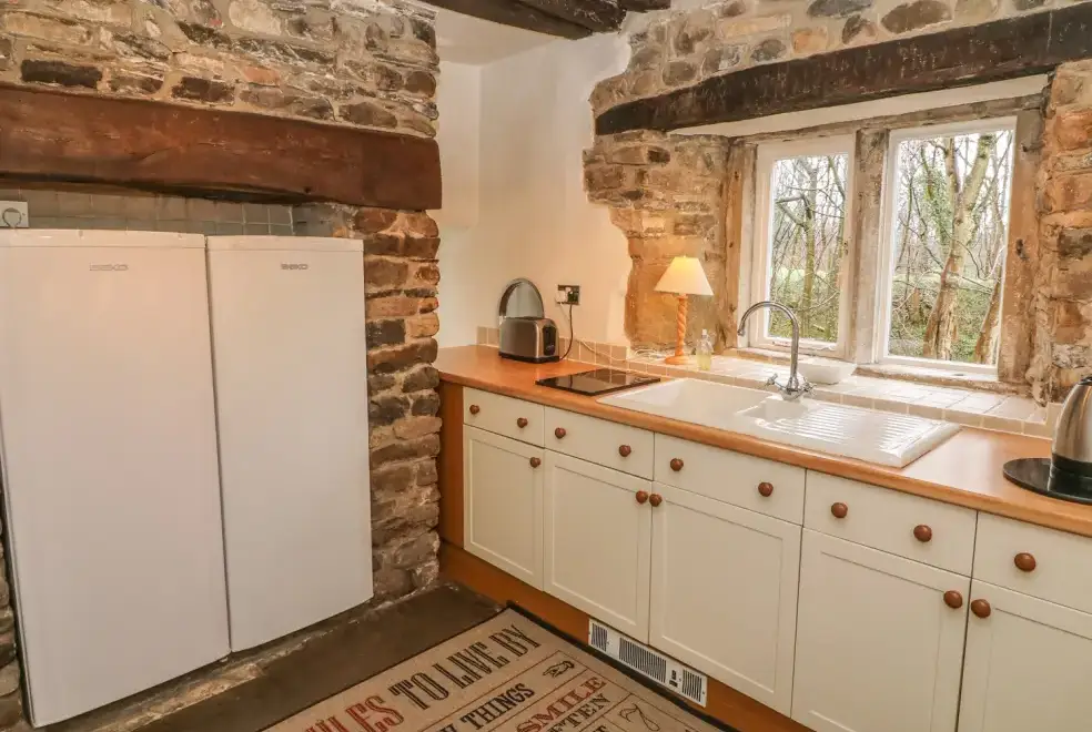Farmhouse style kitchen at Beckside Dogs-welcome Cottage,  The Lake District 