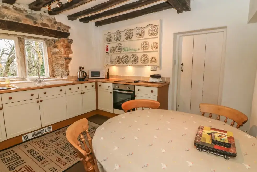 Farmhouse style kitchen at Beckside Dogs-welcome Cottage,  The Lake District 
