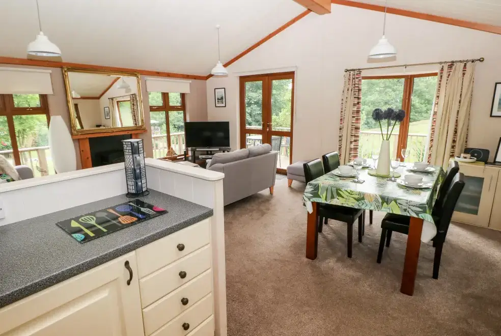 Open plan living area at Beeches Countryside Lodge, Wales