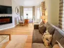 Open plan living area at Black Dog Lodge - thumbnail photo