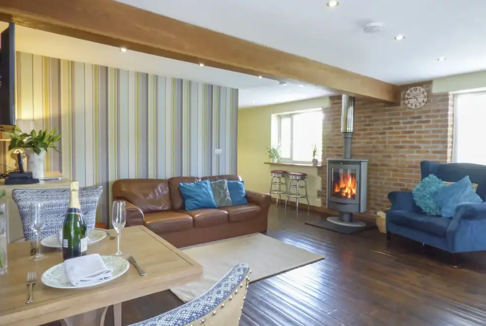 Open plan living area at Blue Oyster Romantic Retreat