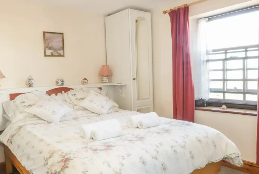 Bedroom at Branscombe Holiday Cottage at Old Higher Lighthouse