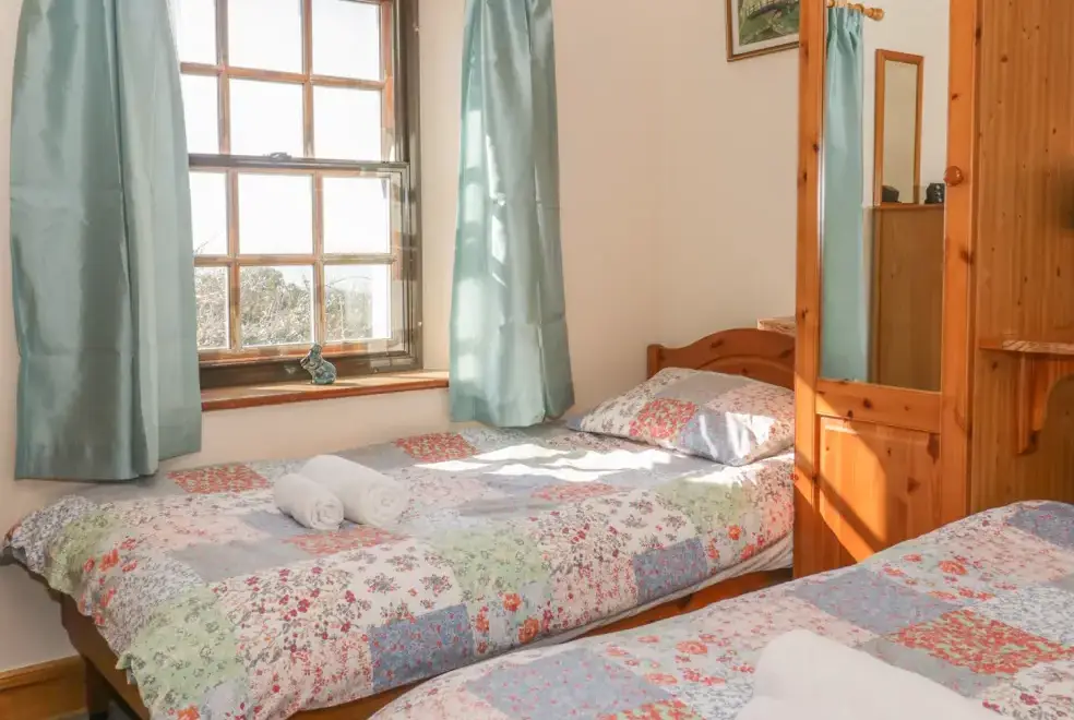 Bedroom at Branscombe Holiday Cottage at Old Higher Lighthouse