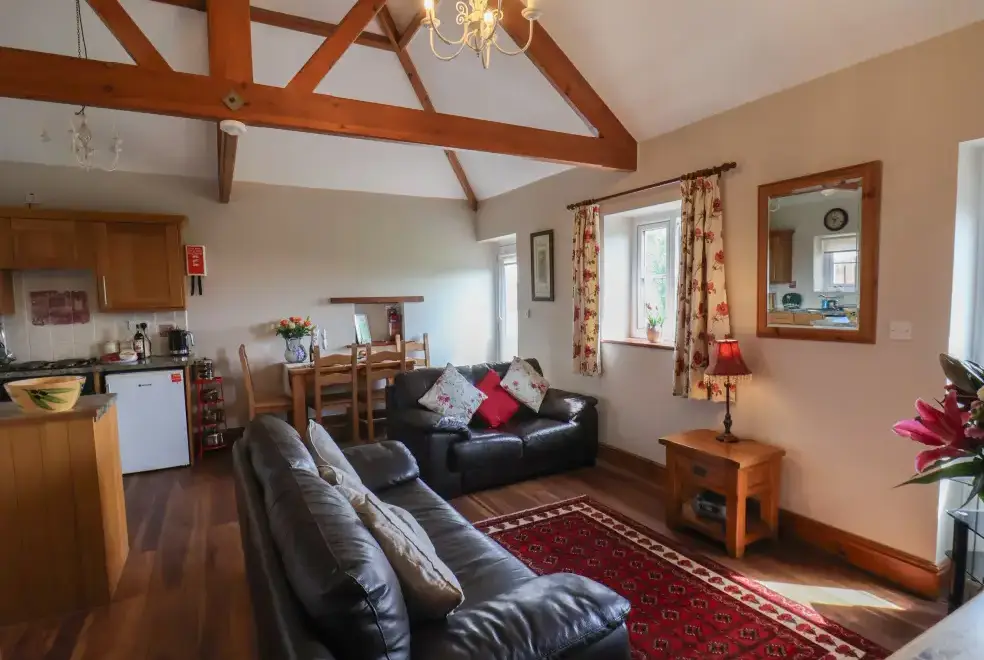 Open plan living area at Broadings Cottage at Broadings Farm